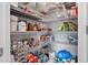 Walk-in pantry with metal shelves at 2168 Aibonito Cir, Clermont, FL 34711