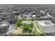 Aerial view showing the property and surrounding area highlighted in yellow at 2459 Mcgregor Oaks Ln, Deland, FL 32720