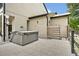 Private backyard includes a hot tub, outdoor shower, and paver patio at 2459 Mcgregor Oaks Ln, Deland, FL 32720
