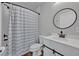 Clean bathroom featuring a shower-tub combo and a stylish vanity at 2459 Mcgregor Oaks Ln, Deland, FL 32720