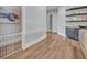 Hallway with modern decor, floating shelves, and neutral paint at 2459 Mcgregor Oaks Ln, Deland, FL 32720