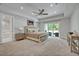 Spacious main bedroom with a ceiling fan, closet, and access to the backyard at 2459 Mcgregor Oaks Ln, Deland, FL 32720