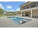 Outdoor living area with fireplace and comfortable seating at 2459 Mcgregor Oaks Ln, Deland, FL 32720