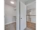 Carpeted walk-in closet with shelving and a view to the hallway at 2459 Mcgregor Oaks Ln, Deland, FL 32720