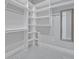 Bright walk-in closet with ample shelving and space for storage at 2459 Mcgregor Oaks Ln, Deland, FL 32720