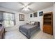 Bedroom featuring a ceiling fan and a window providing natural light at 2625 Eagle Cliff Dr, Kissimmee, FL 34746