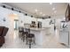 Spacious kitchen featuring white cabinets, granite countertops, and an island with bar stool seating at 2625 Eagle Cliff Dr, Kissimmee, FL 34746