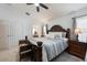 Spacious main bedroom showcasing tiled flooring, comfortable furniture, and serene ambiance at 2625 Eagle Cliff Dr, Kissimmee, FL 34746