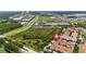 Aerial view of the condominium neighborhood near 'The Loop' shopping center at 3000 Laurel Park Ln # 308, Kissimmee, FL 34741