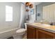 A bathroom with a bathtub, single vanity and natural light from the window at 3000 Laurel Park Ln # 308, Kissimmee, FL 34741