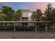 Beautiful condo with ample parking, lush landscaping and an inviting exterior with two stories and exterior balconies at 3000 Laurel Park Ln # 308, Kissimmee, FL 34741
