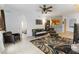 Relax in a cozy living room with a comfy sofa, lounge chair, and modern decor for added style and comfort at 3000 Laurel Park Ln # 308, Kissimmee, FL 34741