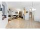 Spacious living room features an open layout and ceramic tile floors for easy maintenance at 3000 Laurel Park Ln # 308, Kissimmee, FL 34741