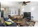 Comfortable living room with cozy furniture, bright light, and an open layout, perfect for entertaining Gathering and friends at 3000 Laurel Park Ln # 308, Kissimmee, FL 34741