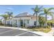 Community clubhouse with a charming facade, surrounded by well-maintained landscaping at 3203 Oyster Ln, Kissimmee, FL 34747