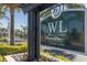 West Lucaya Village Resort sign with lush landscaping and palm trees at 3203 Oyster Ln, Kissimmee, FL 34747
