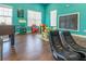 Bright and spacious playroom with comfortable seating, a foosball table, and fun activities for children at 3203 Oyster Ln, Kissimmee, FL 34747