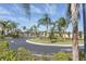 Well-maintained community street surrounded by lush landscaping and inviting atmosphere at 3203 Oyster Ln, Kissimmee, FL 34747