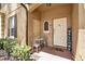 Charming front porch area with seating and a welcoming entrance at 3214 Calabria Avenue, Davenport, FL 33897