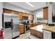 Well-equipped kitchen with stainless steel appliances and ample counter space at 3214 Calabria Avenue, Davenport, FL 33897