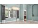 Dining Room featuring a large window, tray ceilings and stunning light fixture at 3307 Kentshire Blvd, Ocoee, FL 34761