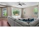 Inviting living room with view to outdoor pool area at 3307 Kentshire Blvd, Ocoee, FL 34761