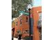 A view of N Main Street with a vintage street lamp, colorful buildings, and benches along the sidewalk at 3307 Kentshire Blvd, Ocoee, FL 34761