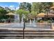 A vibrant splash pad featuring fountains and shaded seating areas, ideal for Gathering fun and relaxation at 3307 Kentshire Blvd, Ocoee, FL 34761