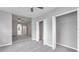 Spacious bedroom with plush carpeting, ceiling fan, and closets; neutral tones to allow for personalized decor at 3824 Blue Dasher Dr, Kissimmee, FL 34744