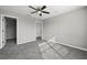 Bedroom featuring gray walls, carpet, ceiling fan at 3824 Blue Dasher Dr, Kissimmee, FL 34744