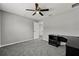 Neutral bedroom featuring ceiling fan and closet at 3824 Blue Dasher Dr, Kissimmee, FL 34744