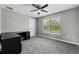 Bedroom with a ceiling fan, window, and a closet at 3824 Blue Dasher Dr, Kissimmee, FL 34744