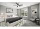 Comfortable primary bedroom with neutral décor and large window at 3824 Blue Dasher Dr, Kissimmee, FL 34744