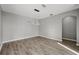 Dining room featuring sleek light fixture and wood flooring at 3824 Blue Dasher Dr, Kissimmee, FL 34744