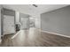 Modern entryway with wood floors, neutral paint, statement light fixture and lots of natural light at 3824 Blue Dasher Dr, Kissimmee, FL 34744