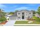 Stunning home with a well-manicured lawn and beautiful curb appeal at 3824 Blue Dasher Dr, Kissimmee, FL 34744