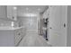 Renovated kitchen featuring quartz countertops and stainless steel appliances at 3824 Blue Dasher Dr, Kissimmee, FL 34744