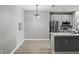 Bright kitchen features modern stainless steel appliances and light gray cabinets at 3824 Blue Dasher Dr, Kissimmee, FL 34744