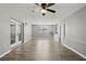 Bright open living room with view of the yard and windows at 3824 Blue Dasher Dr, Kissimmee, FL 34744