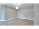 Bright living space featuring modern floors and a elegant chandelier at 3824 Blue Dasher Dr, Kissimmee, FL 34744