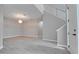 Bright living area featuring new floors, a chandelier, and stairs at 3824 Blue Dasher Dr, Kissimmee, FL 34744