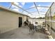 Spacious outdoor patio featuring dining area and grill at 3824 Blue Dasher Dr, Kissimmee, FL 34744