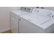 Close-up showcasing a clean, modern washer and dryer set at 3904 Coastal Breeze Dr, Kissimmee, FL 34744