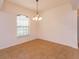 Spacious living room featuring tile flooring, and plenty of natural light at 3904 Coastal Breeze Dr, Kissimmee, FL 34744