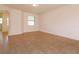Bright and airy living room with tile floors and lots of natural light at 3904 Coastal Breeze Dr, Kissimmee, FL 34744