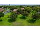 Lush green lawn surrounding condos in park-like setting, with parking and mature trees at 420 Forestway Cir # 206, Altamonte Springs, FL 32701