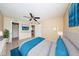 Virtually staged bedroom with walk-in closet, and view to the kitchen and bathroom at 420 Forestway Cir # 206, Altamonte Springs, FL 32701