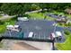 Aerial view of RV/Boat parking lot surrounded by mature trees, offering secure storage at 420 Forestway Cir # 206, Altamonte Springs, FL 32701
