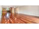 Spacious living room with gleaming hardwood floors and an open layout at 4300 Lake Underhill Rd # D, Orlando, FL 32803