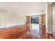 Expansive living room featuring hardwood floors, recessed lighting, and a bright, open feel at 4300 Lake Underhill Rd # D, Orlando, FL 32803